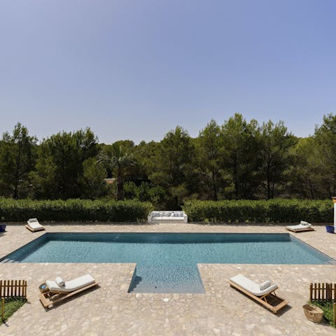 Embrace total relaxation with lazy afternoons by the pool
