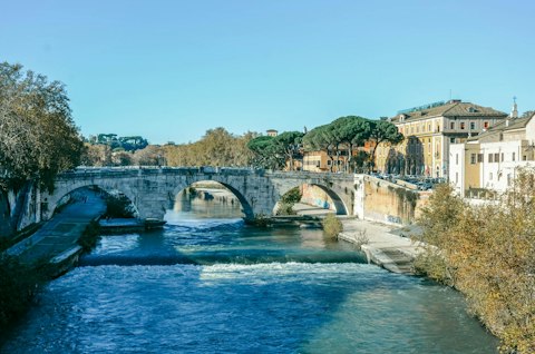 Cross Ponte Sisto, a Renaissance pedestrian bridge offering magical Tiber views