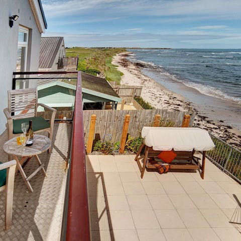 Take in the restless ocean from the balcony vantage point