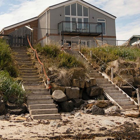 Follow the steps from your home straight to the sandy beach