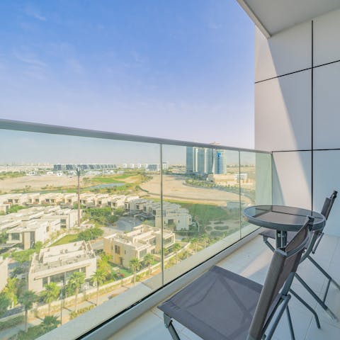 Admire the panoramic cityscape views from your private balcony