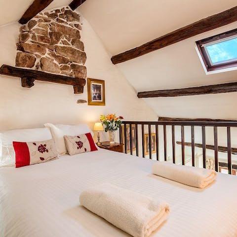 Feel like you're living in your own fairy tale amidst the stone walls and exposed wooden beams