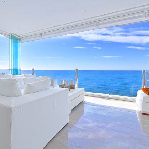 Enjoy blissful sea views while relaxing on the terrace