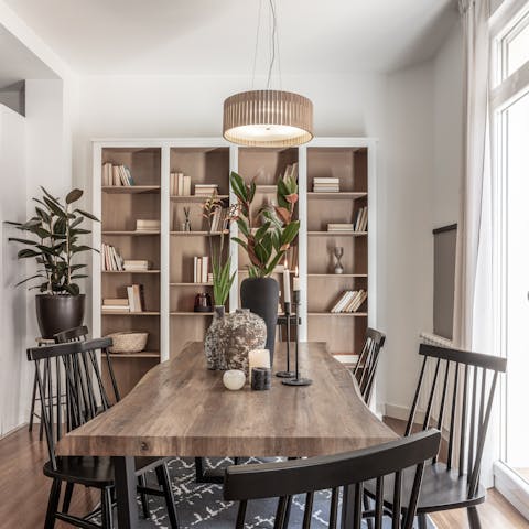 Tuck into tasty tapas dishes around the stylish dining table