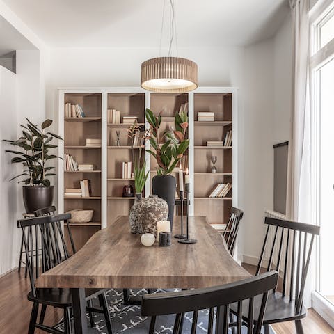 Tuck into tasty tapas dishes around the stylish dining table