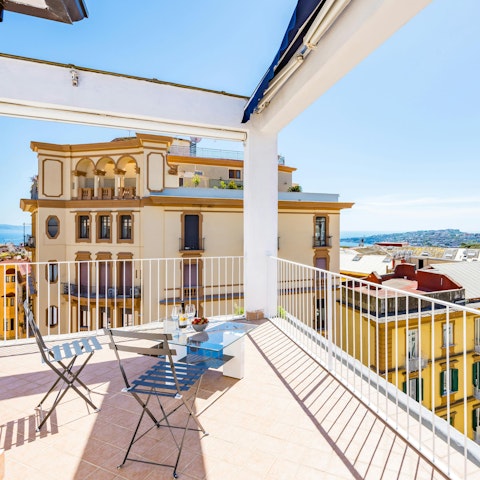 Sit out on the terrace and admire the views of Naples
