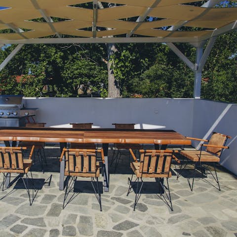 Serve up some Greek-inspired culinary delights at the alfresco dining area