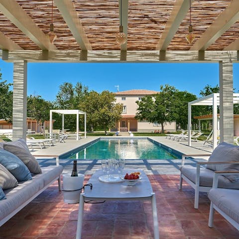 Go for a dip in the private pool or chill under the pergola