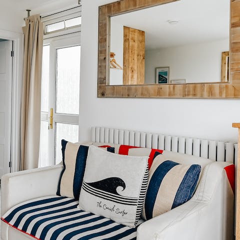 Unwind with your holiday read in the cosy nautical loveseat