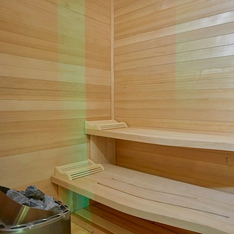 Unwind body and mind in the private sauna