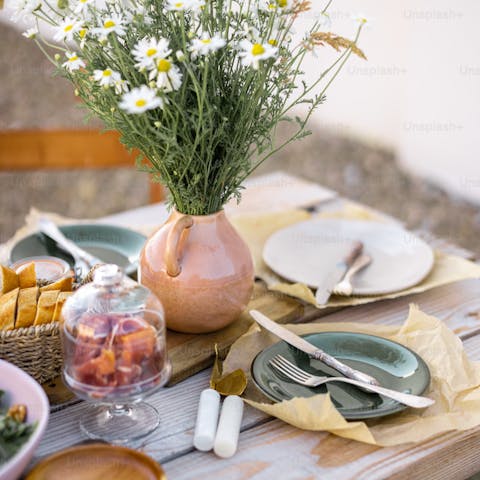 Dine and raise a glass on the alfresco terrace as day fades