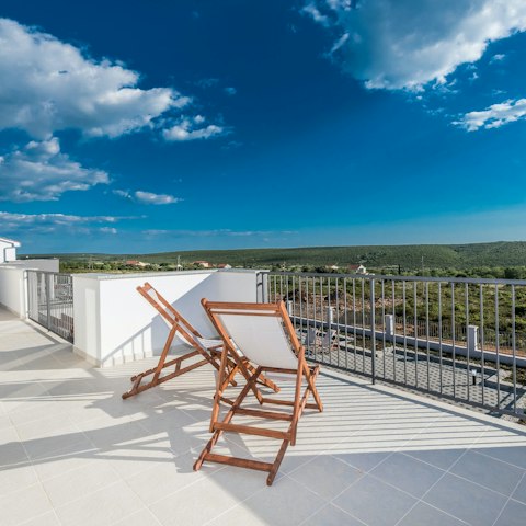 Sip a glass of wine and admire the views