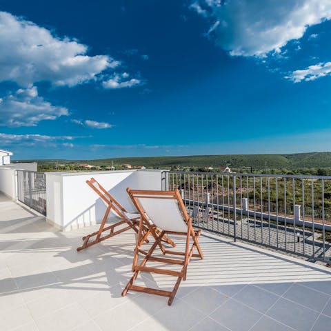 Sip a glass of wine and admire the views