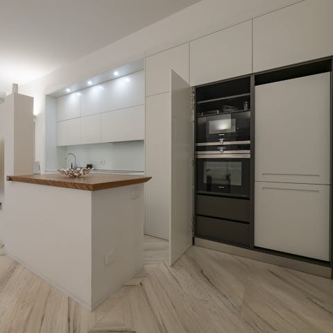 Cook for yourselves in the sleek kitchen or dine out in Milan