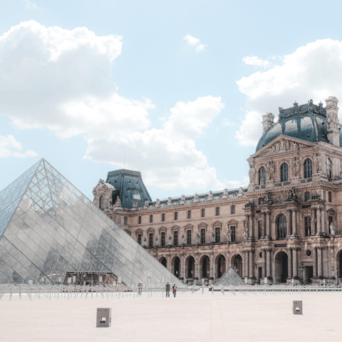 Discover centuries of art at the Louvre - an eight-minute walk away