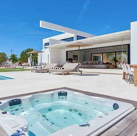 Soak under the stars in the jacuzzi