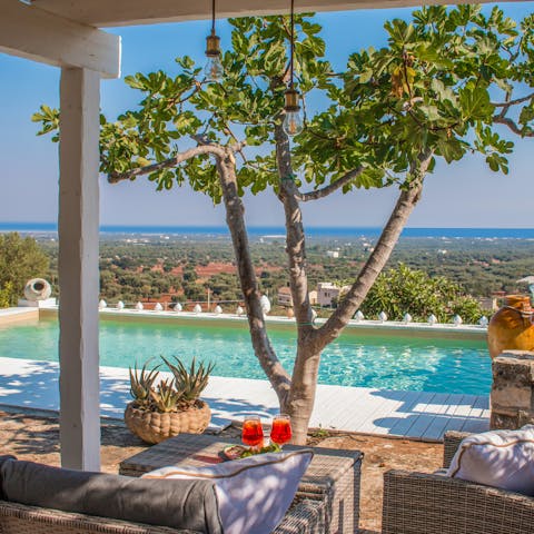 Spend lazy days lounging by the private pool