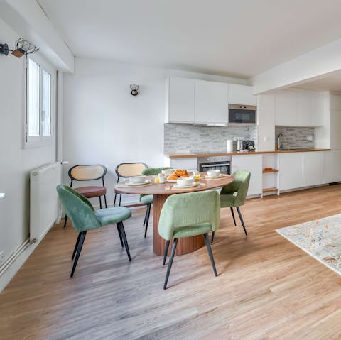 Lay the table for brunch in the light-filled dining area