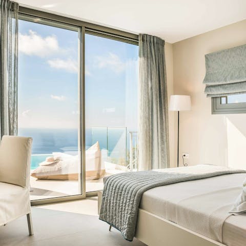 Wake to views of the infinity pool blending seemlessly with the sea