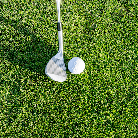 Tee off Cirencester Golf Club, a fifteen-minute drive away