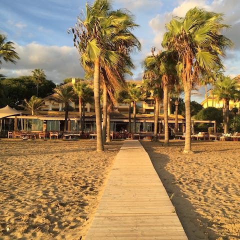 Enjoy the facilities at the exclusive restaurant and beach club, 400 metres away