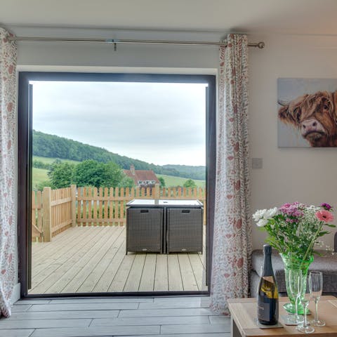 Open up the glass doors in the living room and let the country air flow through