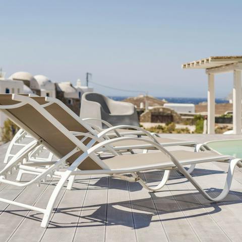 Idle by the private pool with a good book