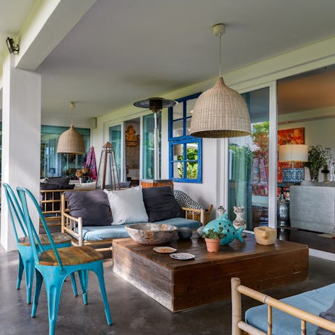 Grab a good book and relax on the colourful veranda
