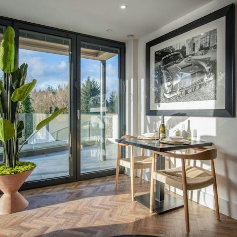 Enjoy meals while sun basks through the ceiling-to-floor windows