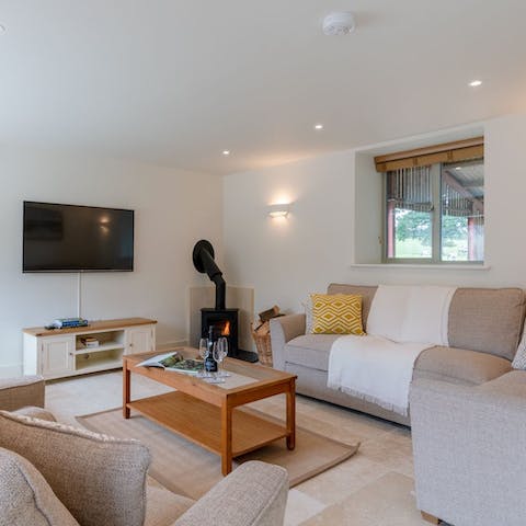 Relax in front of the wood-burning stove with a hot chocolate in hand