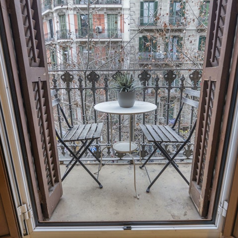 Take a time out to enjoy a glass of wine on the balcony