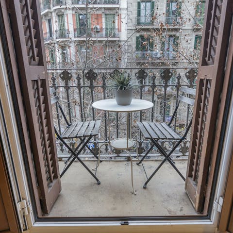 Take a time out to enjoy a glass of wine on the balcony