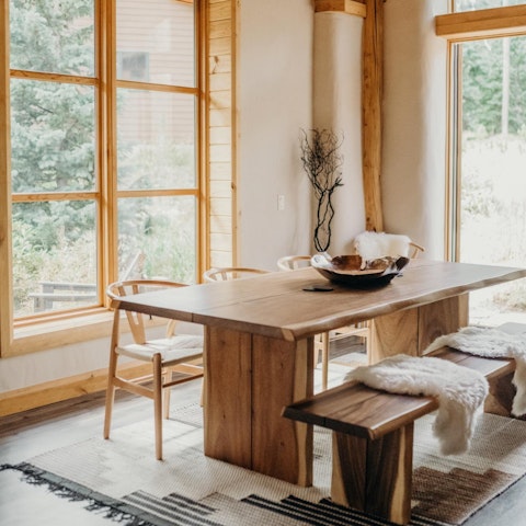 Start the day in the sunny breakfast nook overlooking the trees