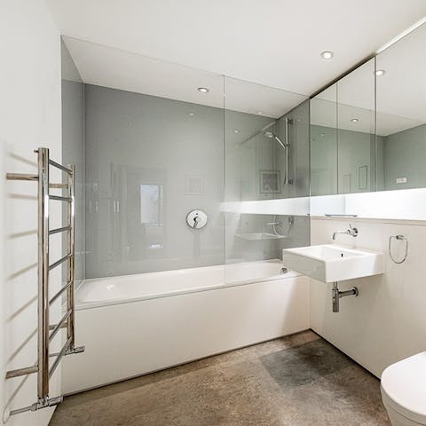 Sink into a nice hot bath in the en-suite bathroom