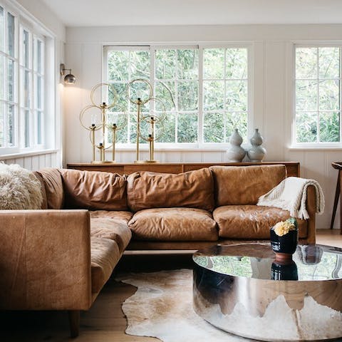 Sink into the leather sofa