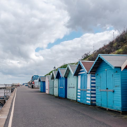 Spend your days on the sand of Cromer beach – it's a thirteen-minute walk