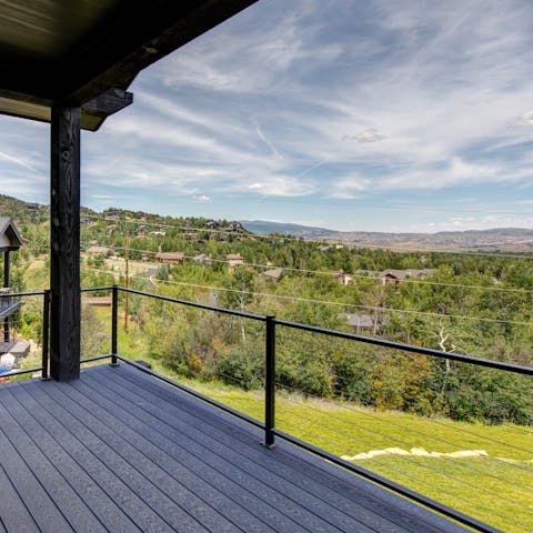 Admire the fantastic views over the mountains from the balcony