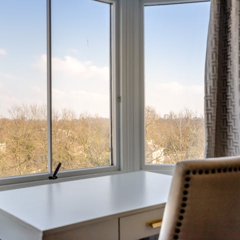 Catch up on work at the desk in the bedroom