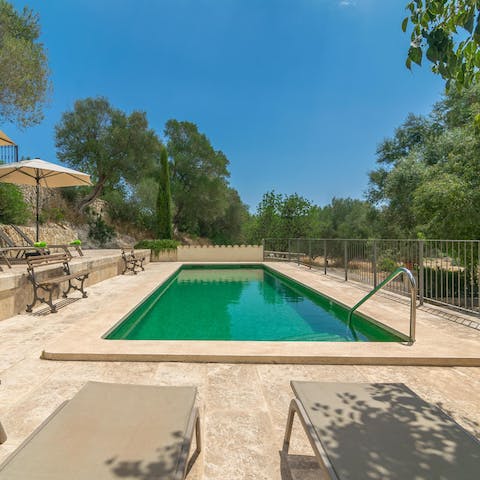 Relax by the emerald green pool