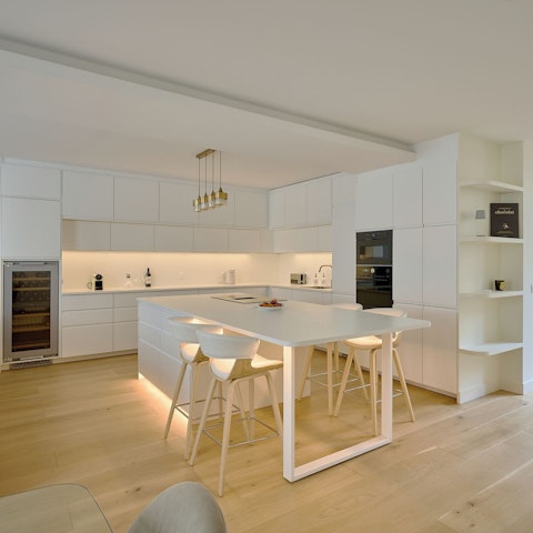 Nibble on brie and share a glass of French wine in the living area