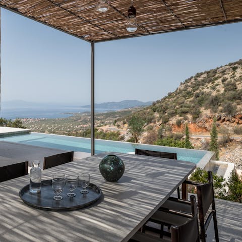 Enjoy the beautiful views while savouring traditional Greek meals