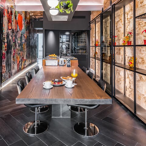 Share communal meals and tapas in the stylish dining area