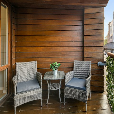 Wind down with evening drinks on the little balcony