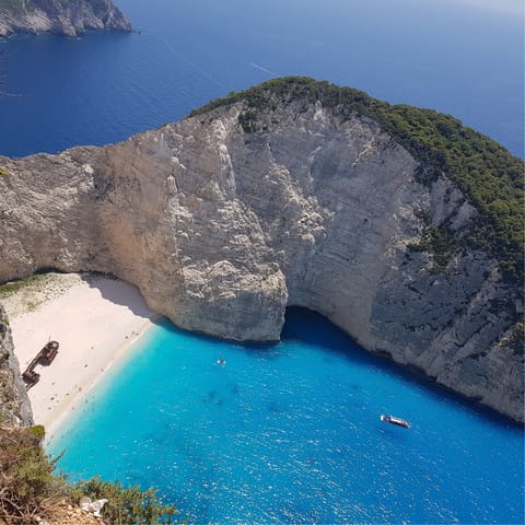 Explore the beautiful sandy beaches and azure waters near Volimes