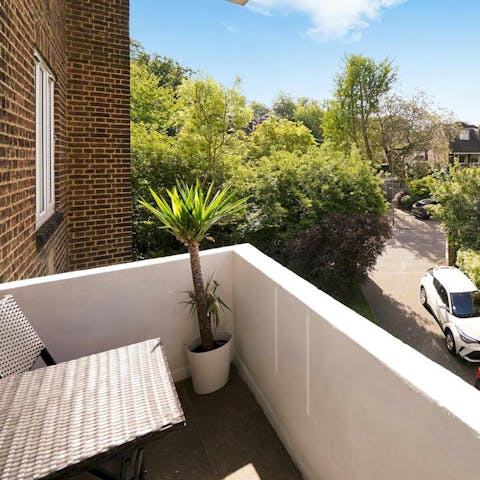 Enjoy leafy garden views from the peaceful private balcony