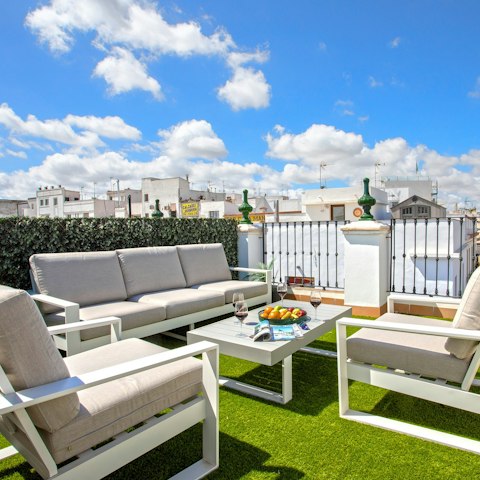 Share bottles of sangria on the comfy cushions