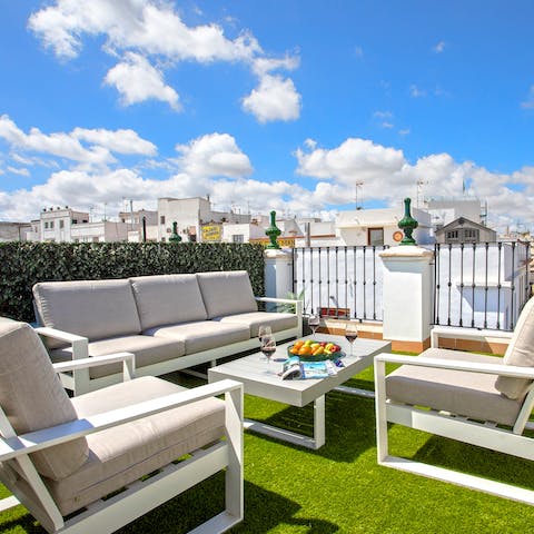 Share bottles of sangria on the comfy cushions