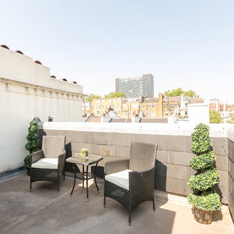 Sip sundowners on your private rooftop terrace