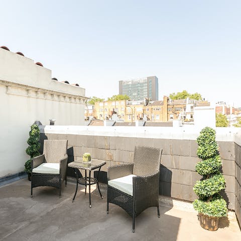 Sip sundowners on your private rooftop terrace