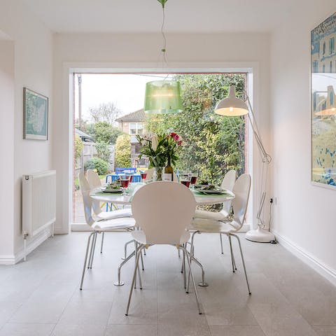 Gather for celebratory drinks and meals around the dining table